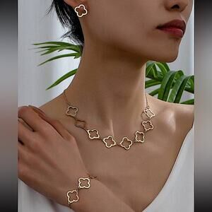 Gold Four Leaf Hollow Out Necklace Bracelet Matching Earrings Three Piece Set